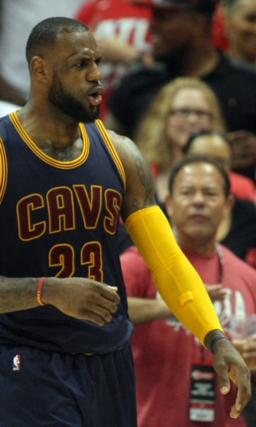 LeBron takes a selfie mid-court with family (PHOTO)
